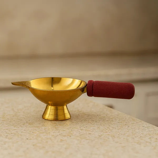 Golden Finish Brass Diya With Wooden Handle