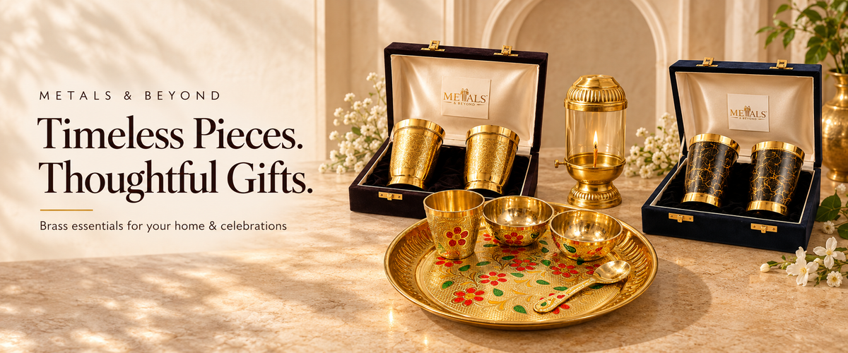 Metals & Beyond brass thali, chimney diya and gift-boxed glass sets — Timeless Pieces. Thoughtful Gifts.